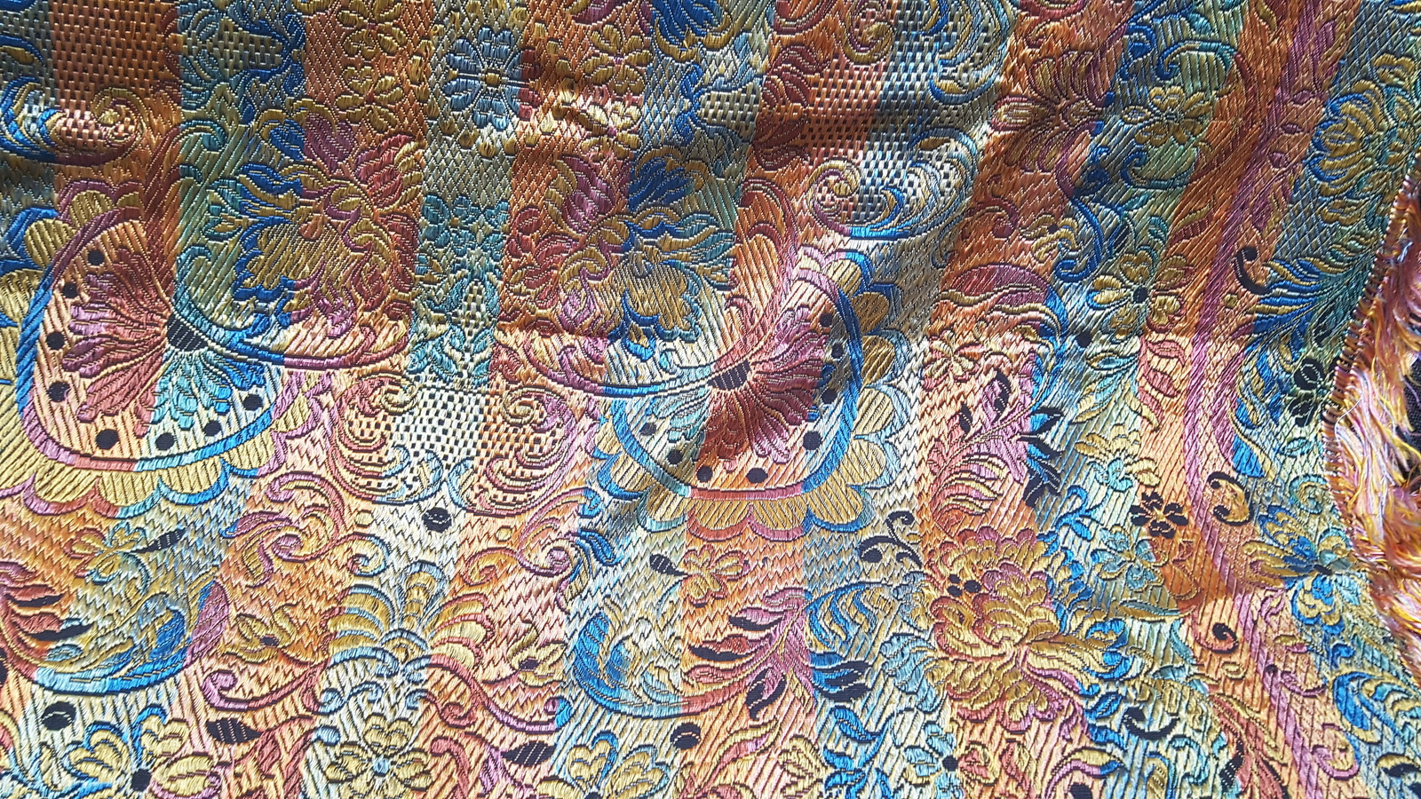 Discover our vintage Italian designer silk tapestry, handwoven and adorned with floral scrolls. Sourced from Paulo Rossini! Invest in this unique piece today.