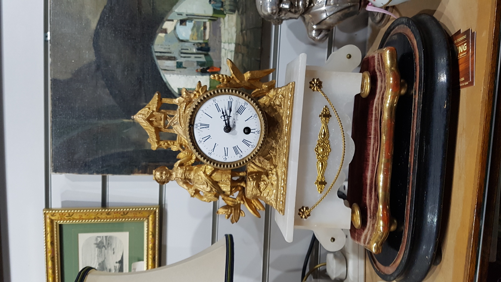 Discover our range of 19th-century French gilt metal and alabaster mantle clocks. Featuring female figure designs and a glass dome. Shop now for your perfect mantelpiece addition.
