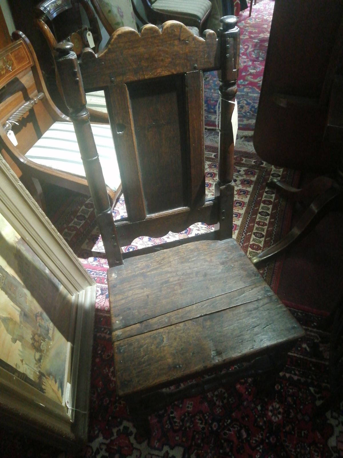 Discover our stunning mid-17th century oak chair in good condition. Explore vintage charm for your living space today! Buy now and add a historical touch to your home.