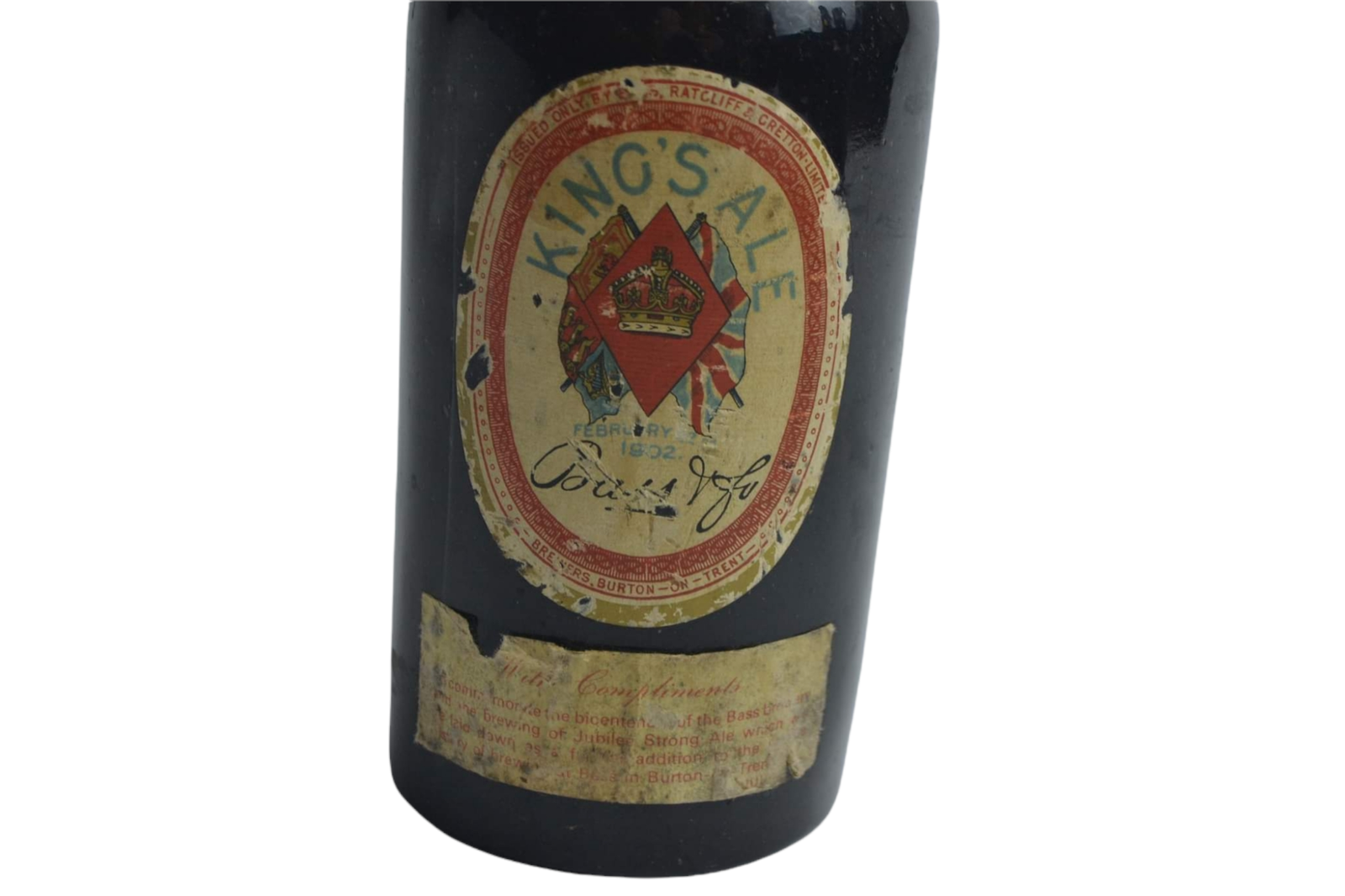 Unearth a piece of history with our 1902 Kings Ale, a rare, unopened bottle with contents. Brewed to celebrate royal occasions, now available for your collection. Grab this treasure now!
