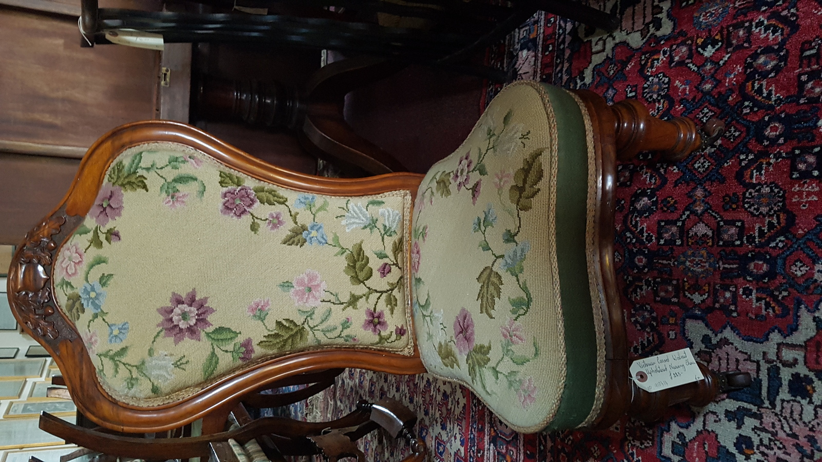 A Victorian Carved Walnut And Upholstered Nursing Chair