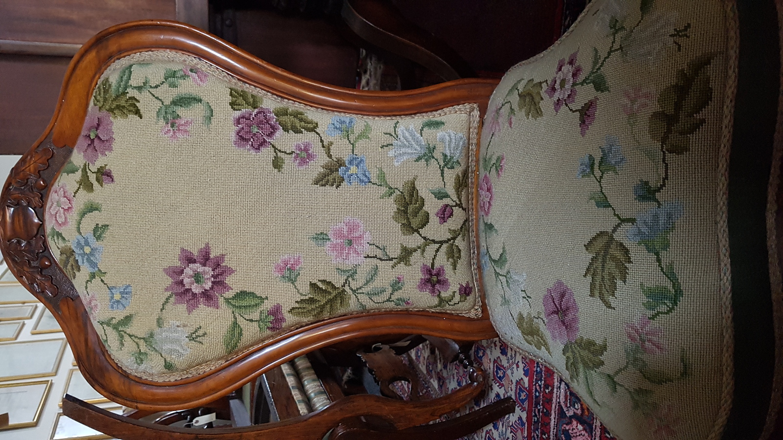 A Victorian Carved Walnut And Upholstered Nursing Chair
