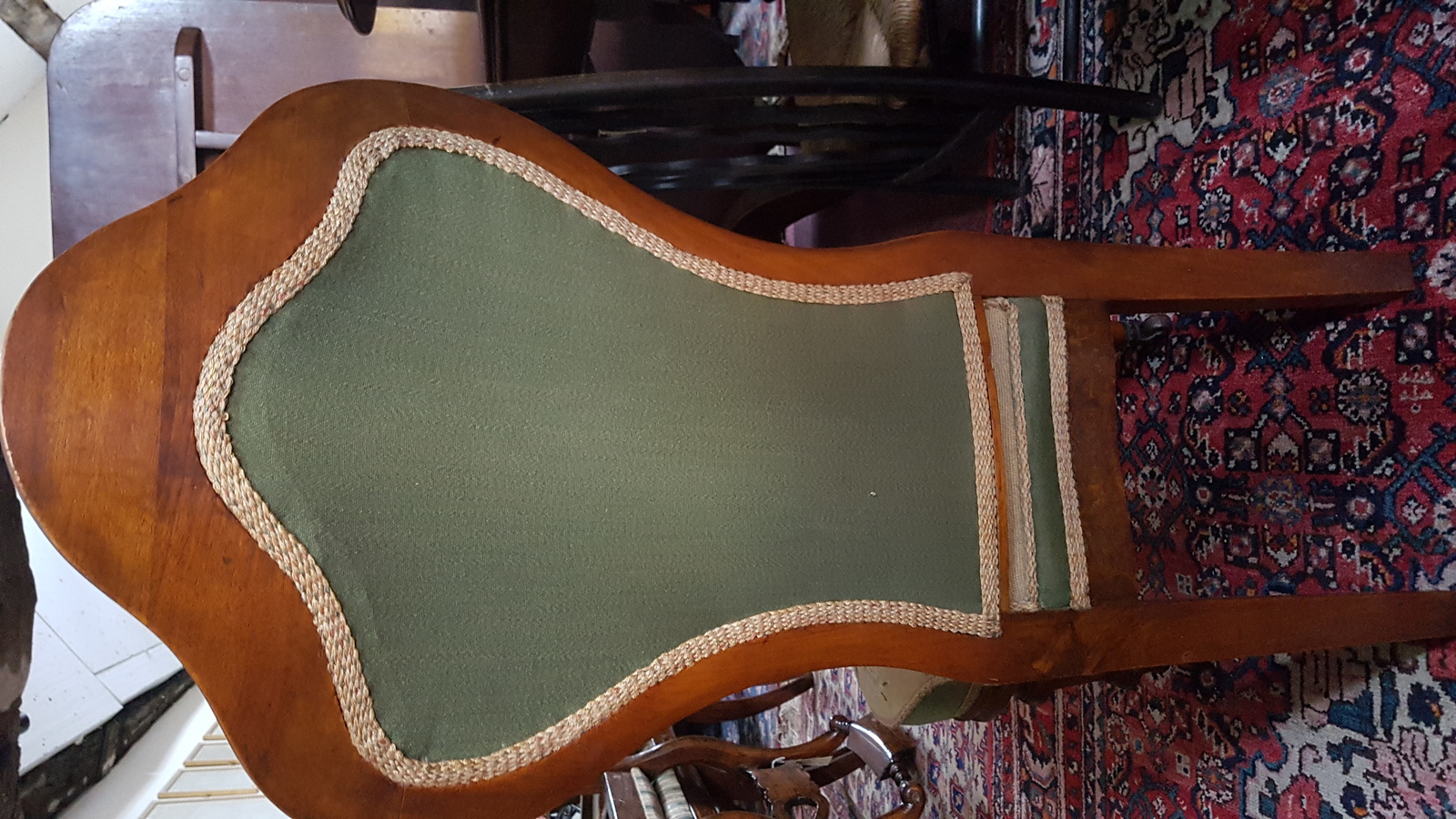 A Victorian Carved Walnut And Upholstered Nursing Chair