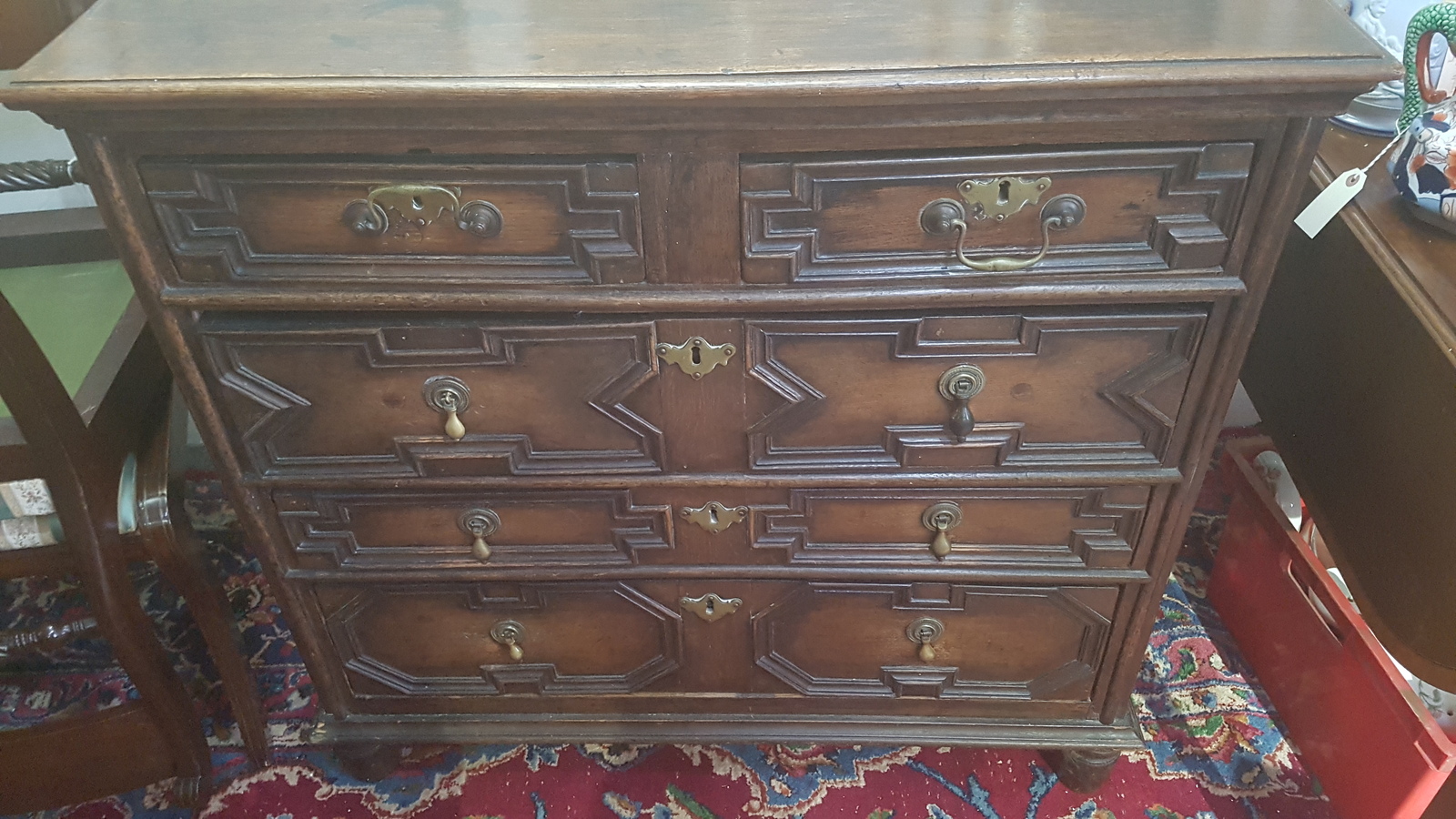 Discover our William and Mary period oak chest, featuring two short and two long drawers with brass fittings. In excellent condition. Shop now for historical accuracy!