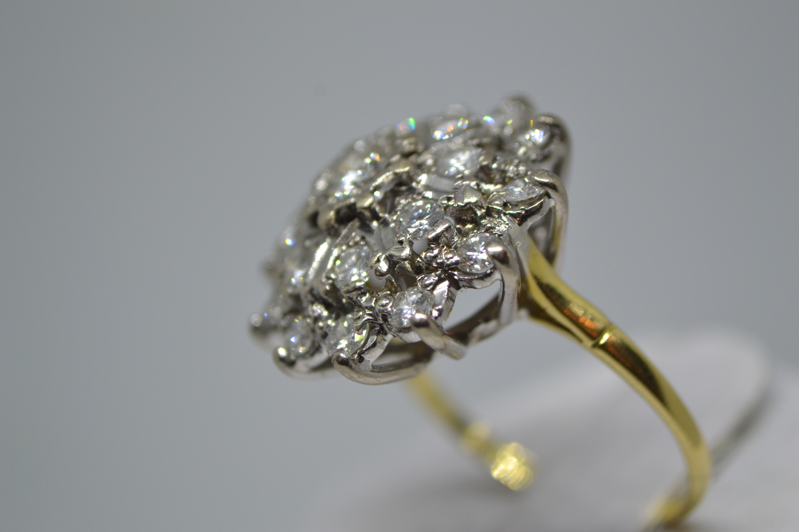 Discover our 18ct gold large diamond cluster ring, with over 1ct in diamonds and a total weight of 6.1g. Hallmarked in Birmingham in 1982. Shop today!