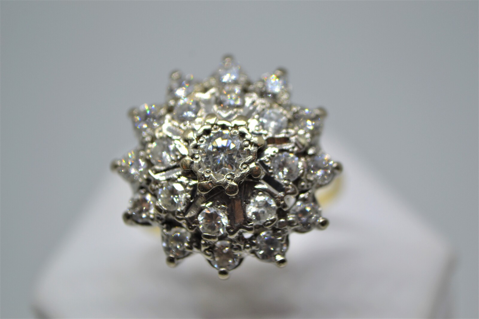 Discover our 18ct gold large diamond cluster ring, with over 1ct in diamonds and a total weight of 6.1g. Hallmarked in Birmingham in 1982. Shop today!