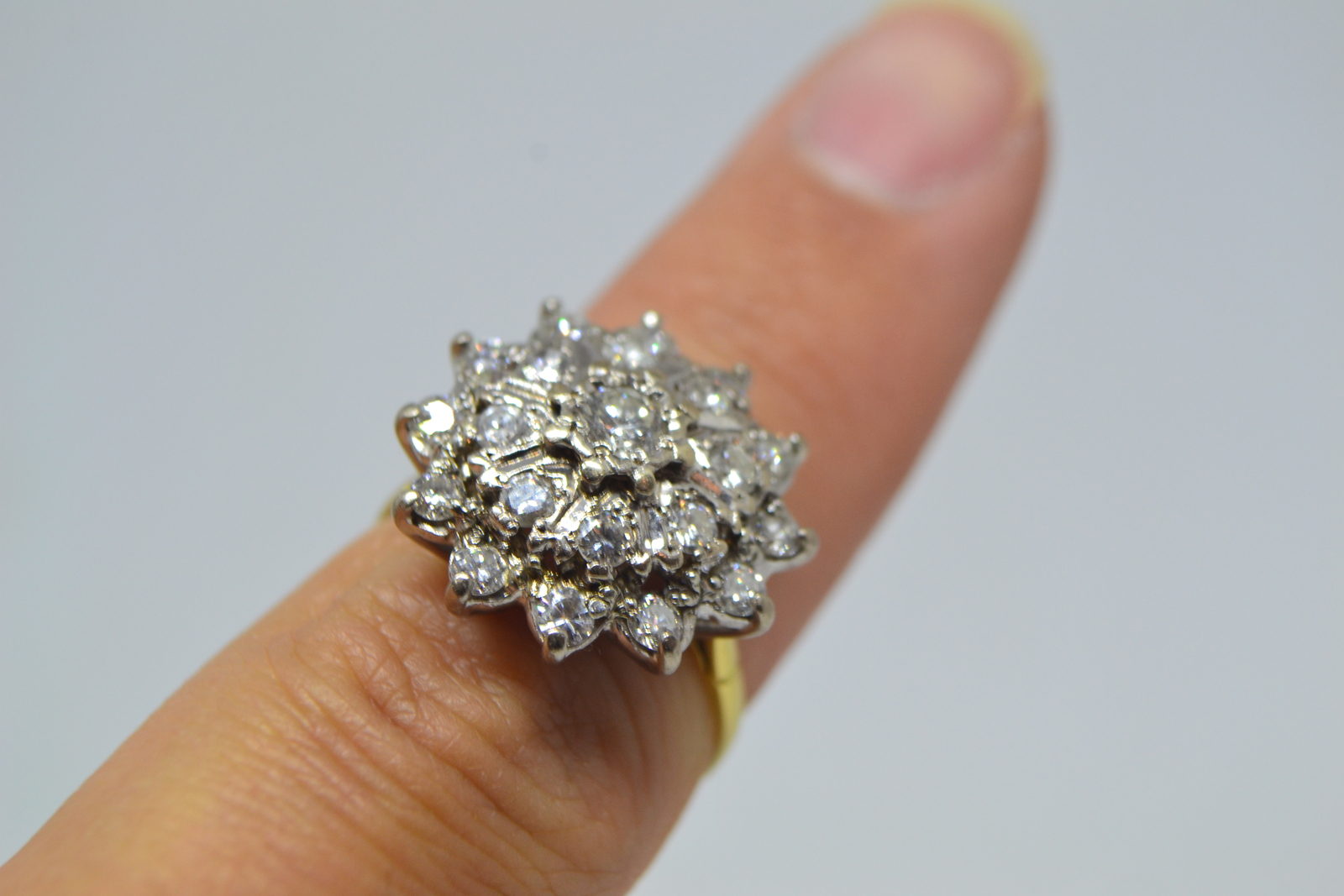 Discover our 18ct gold large diamond cluster ring, with over 1ct in diamonds and a total weight of 6.1g. Hallmarked in Birmingham in 1982. Shop today!