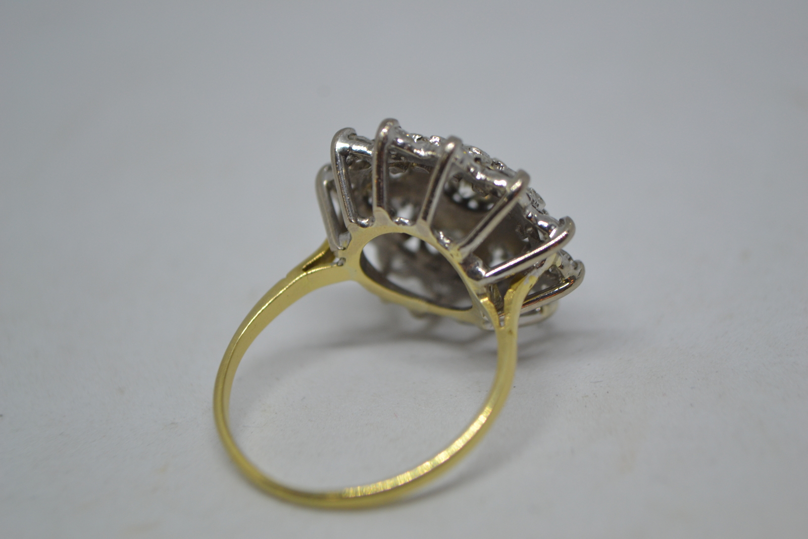 Discover our 18ct gold large diamond cluster ring, with over 1ct in diamonds and a total weight of 6.1g. Hallmarked in Birmingham in 1982. Shop today!