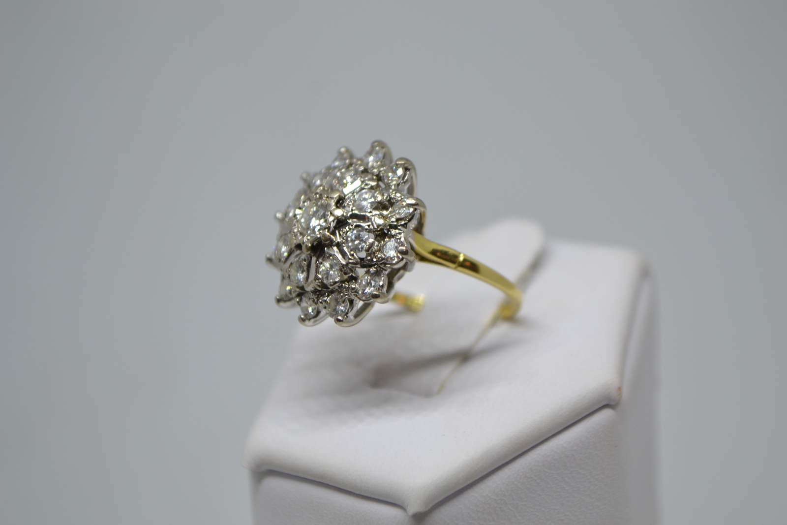 Discover our 18ct gold large diamond cluster ring, with over 1ct in diamonds and a total weight of 6.1g. Hallmarked in Birmingham in 1982. Shop today!
