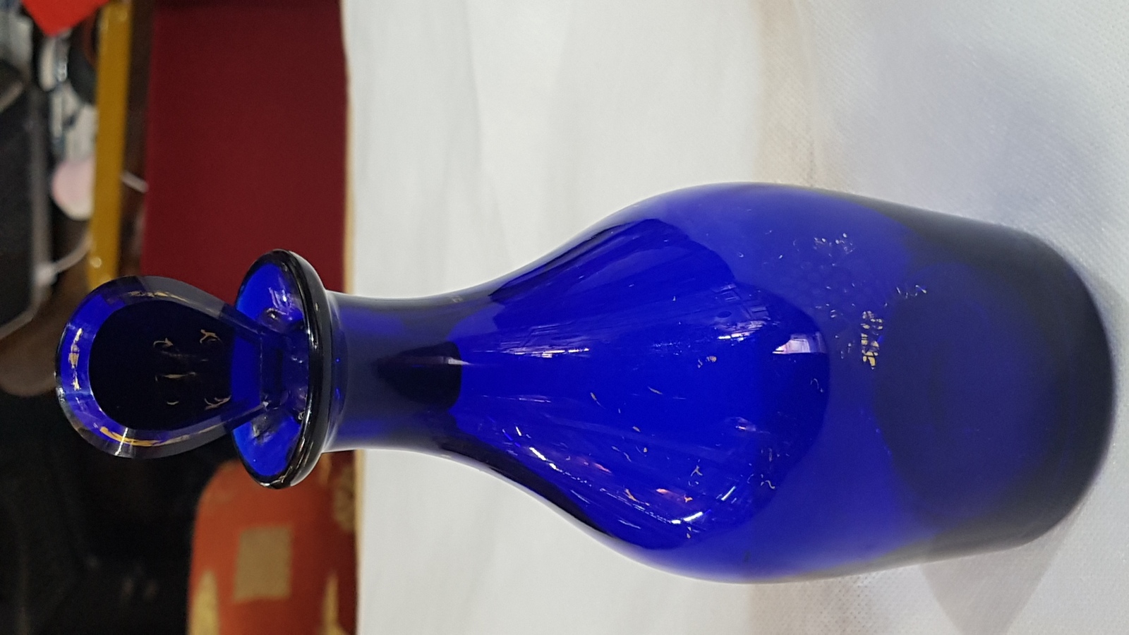 Discover our 19th c. Bristol blue decanter bottle with restored stopper. Unique gold lettering, size 9 inches. Shop now!