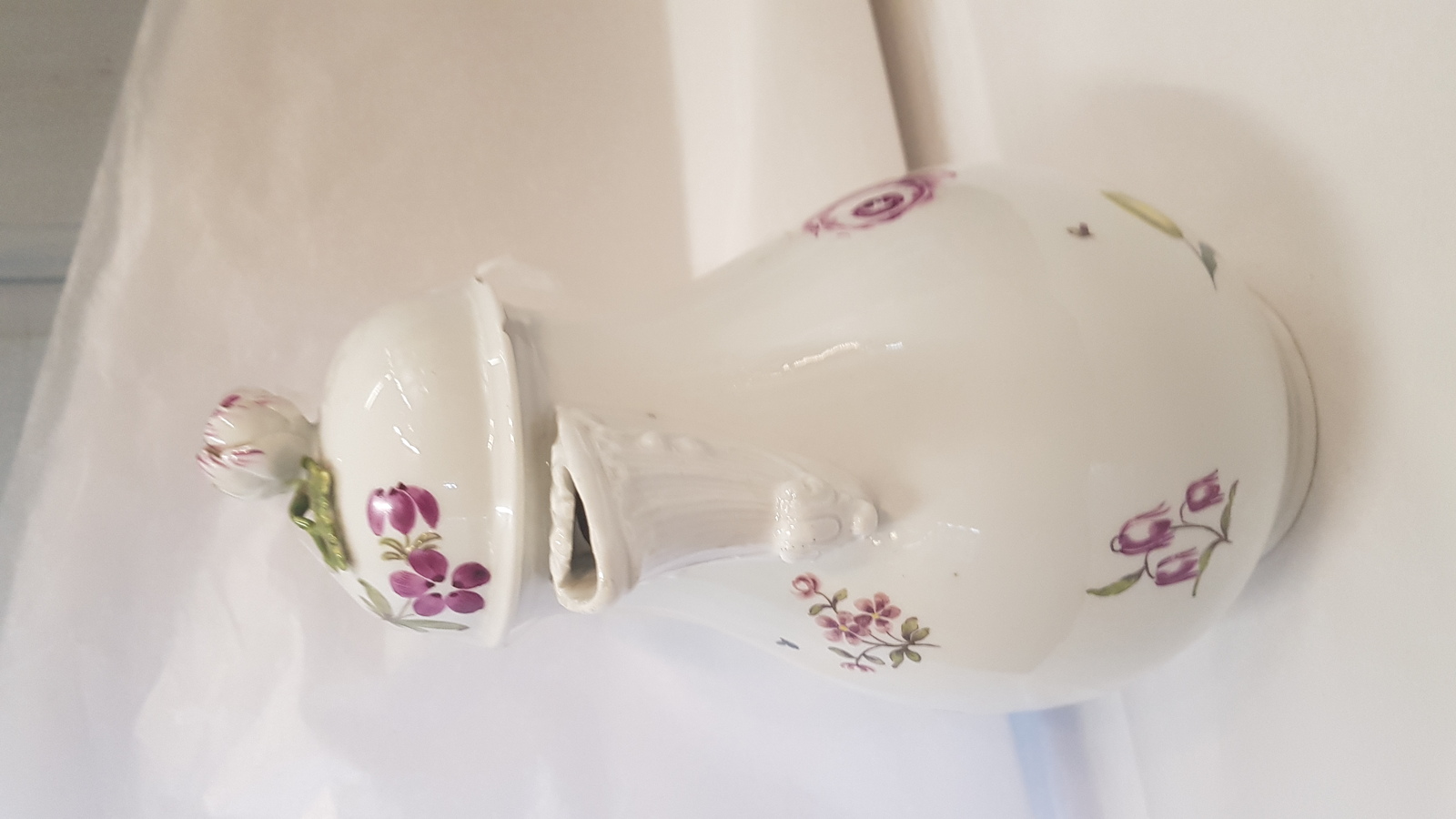 Discover the charm of 18th century Meissen porcelain coffee pot. Decorated with Deutsche Blumen on pure white ground, it's a perfect blend of art and history. Explore now!