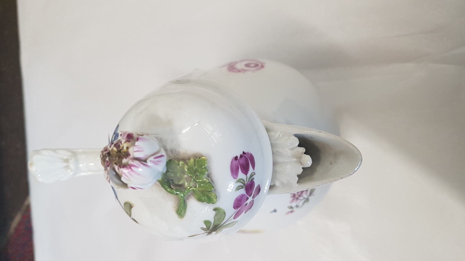 Discover the charm of 18th century Meissen porcelain coffee pot. Decorated with Deutsche Blumen on pure white ground, it's a perfect blend of art and history. Explore now!