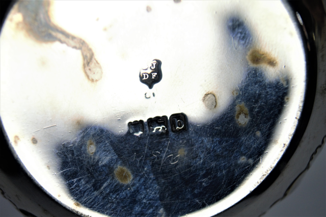 A Silver Two Handled Loving Cup With Repousse Decoration.