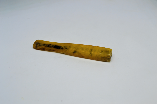 A Tortoise Shell Cigarette Holder.