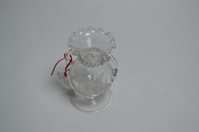 Explore our collection of Stevens and Williams clear glass vases. Our featured piece from 1880 stands 17cm high. Shop now for this timeless antique!