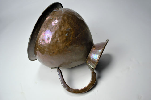 Discover our Early 19th c. Two Gallon Copper Hay Stack Jug, 29 cm high. Explore the antique heritage in design. Shop now for timeless elegance!