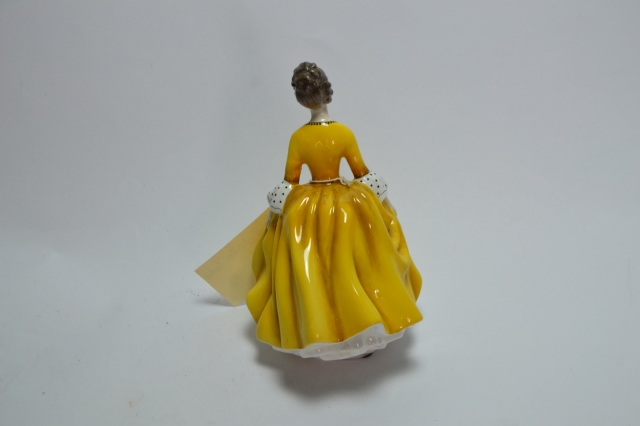 Discover the exquisitely crafted Royal Doulton 'Coralie' figurine. Hurry, get this timeless collectible today to refine your porcelain collection!