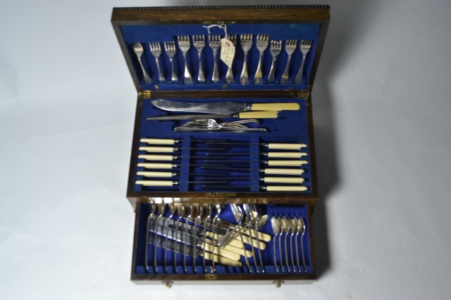 Discover our exquisite Edwardian oak canteen filled with 58 pieces of bone-handled stainless steel cutlery. Predominantly from George Wolstenholme & Son, Sheffield. Shop now!