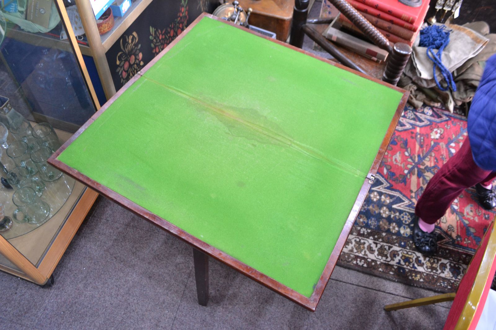 Discover our George III Mahogany card table. Despite wear on its green cover, it remains in reasonable condition. Shop now for vintage furniture delights!