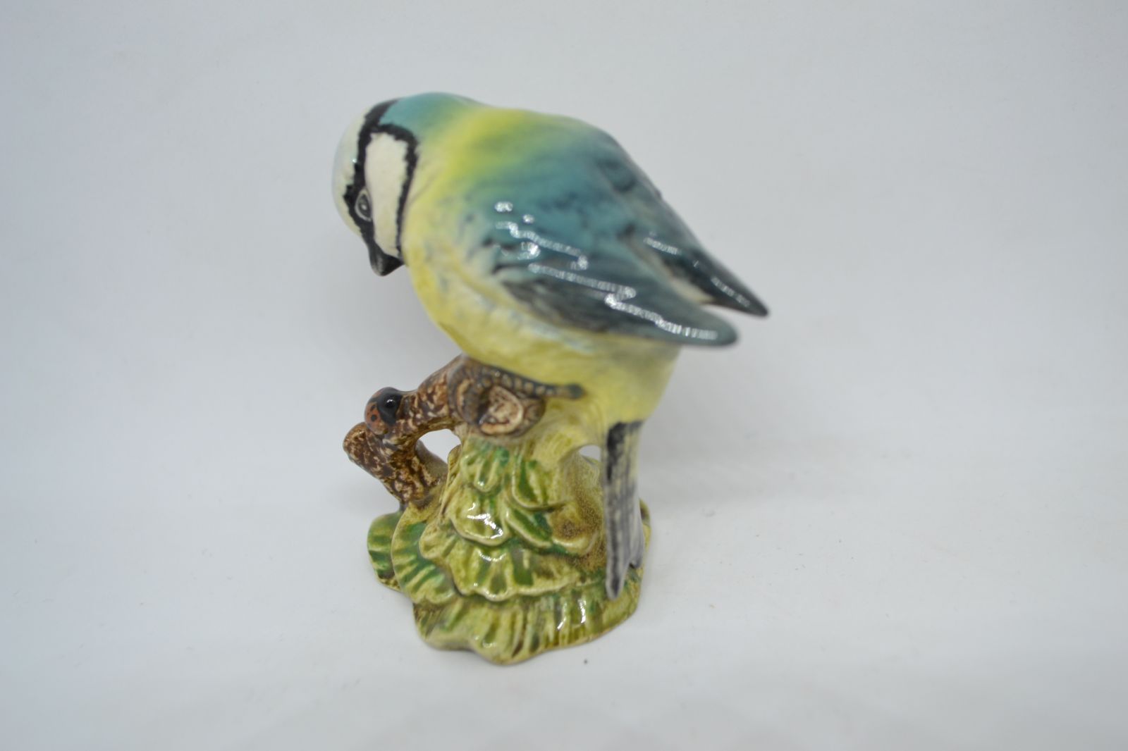 Discover the iconic Beswick England Blue Tit, No 992. Explore its unique charm in detail, measuring 6cm high. Order now for an authentic collector's delight!