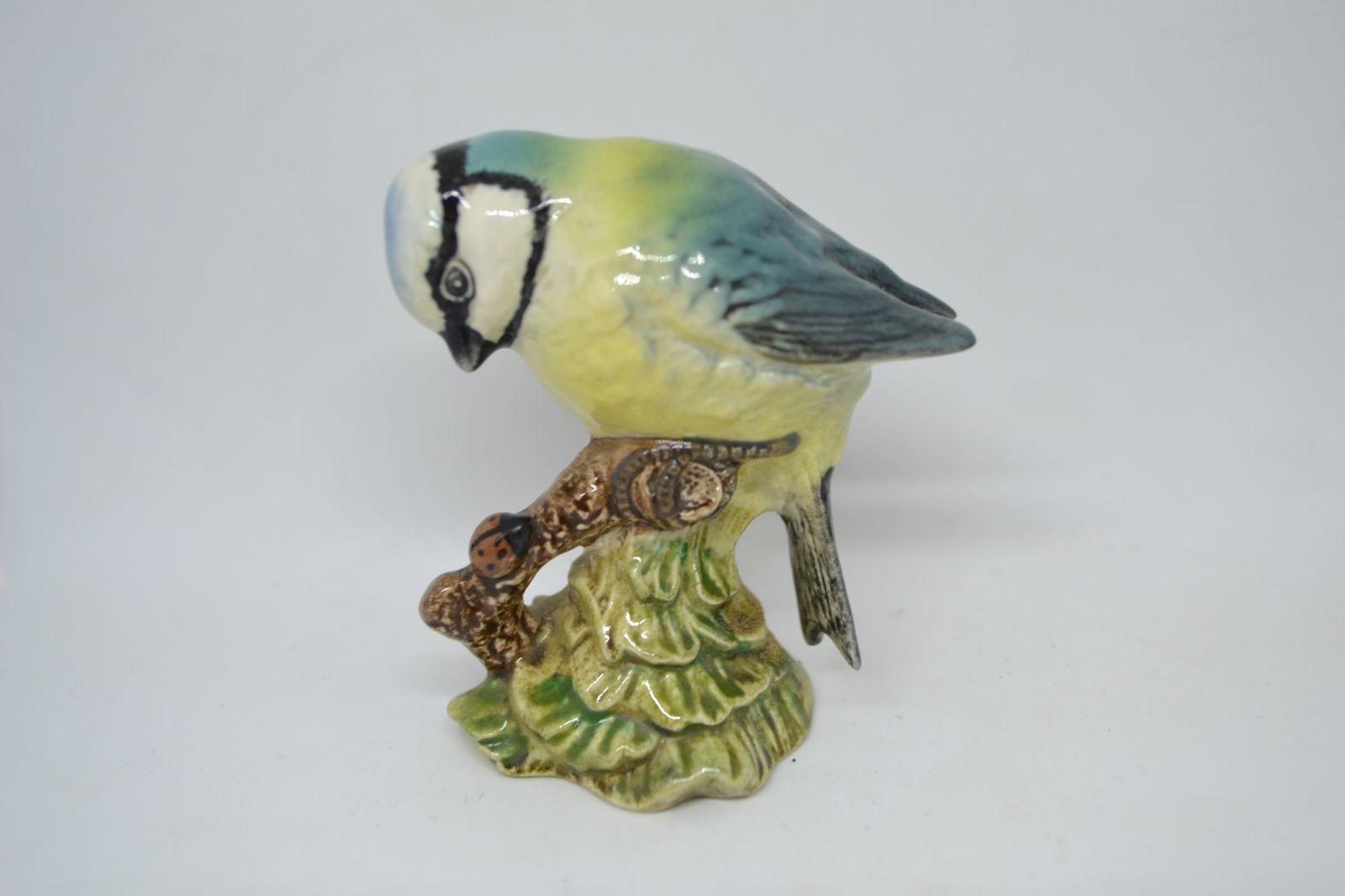 Discover the iconic Beswick England Blue Tit, No 992. Explore its unique charm in detail, measuring 6cm high. Order now for an authentic collector's delight!