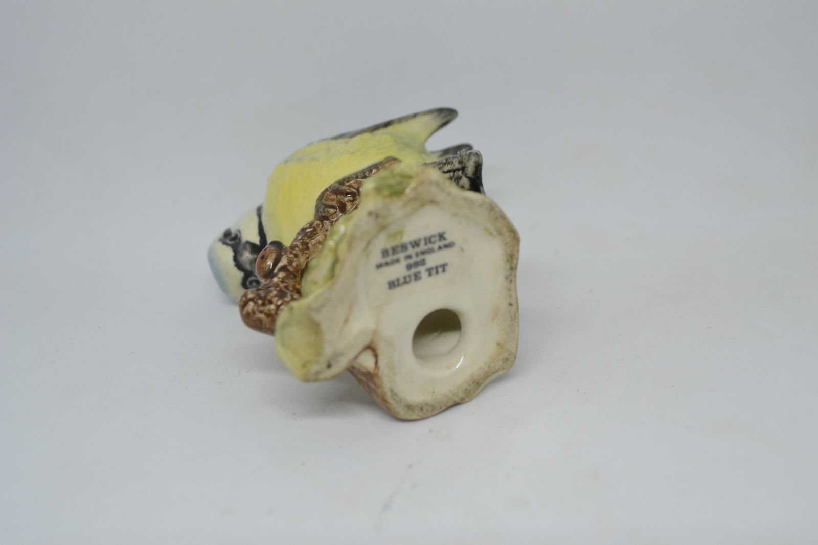 Discover the iconic Beswick England Blue Tit, No 992. Explore its unique charm in detail, measuring 6cm high. Order now for an authentic collector's delight!