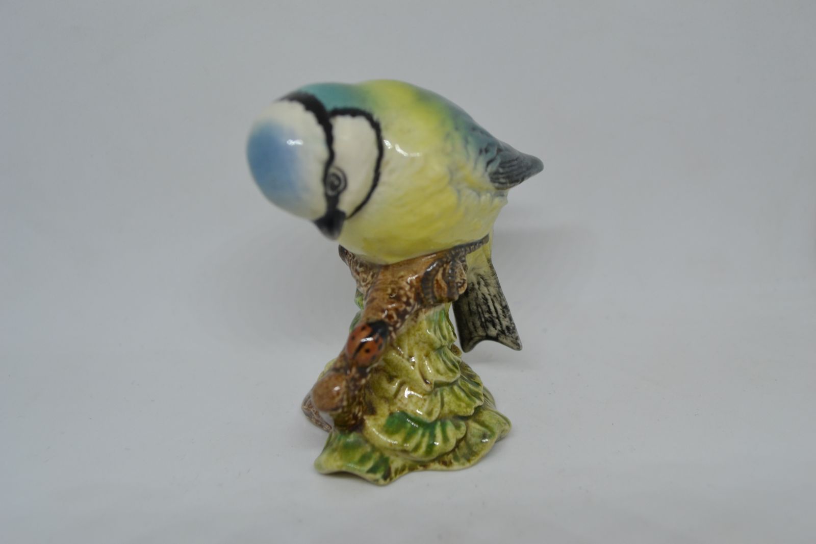 Discover the iconic Beswick England Blue Tit, No 992. Explore its unique charm in detail, measuring 6cm high. Order now for an authentic collector's delight!