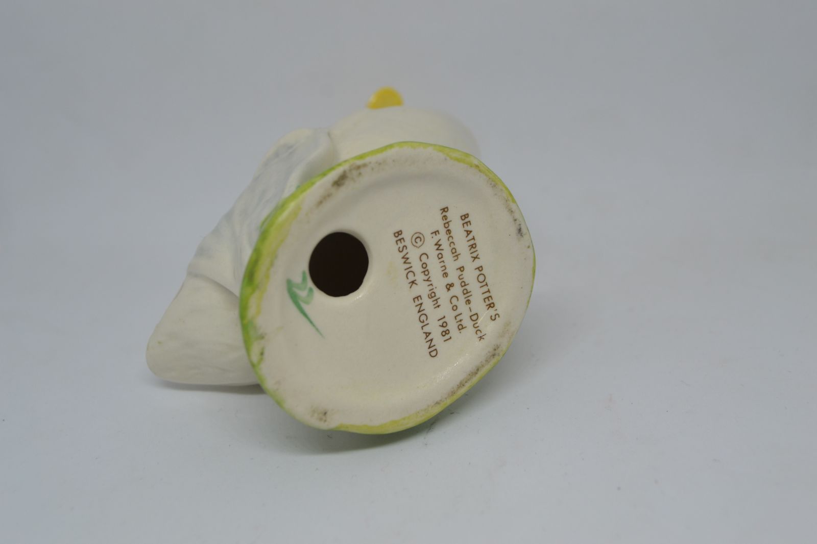 Discover our collection of Beatrix Potter's 'Rebecca Puddle Duck' by Beswick, England. Sized 8.5cm high. Shop now for enduring memories and charm.