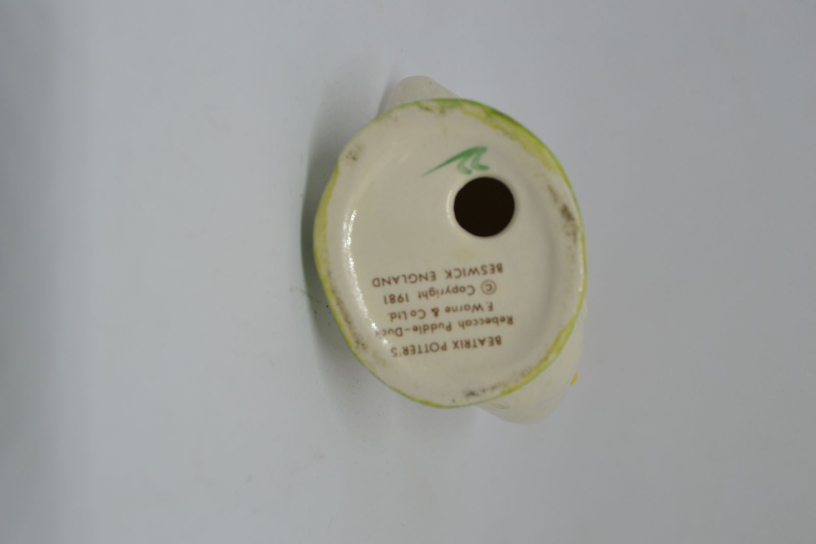 Discover our collection of Beatrix Potter's 'Rebecca Puddle Duck' by Beswick, England. Sized 8.5cm high. Shop now for enduring memories and charm.