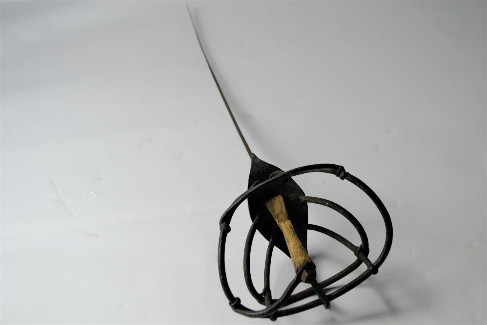 Explore our selection of 19th-century Germanic wrought iron practice swords. Own a piece of history in reasonable condition. Shop now!