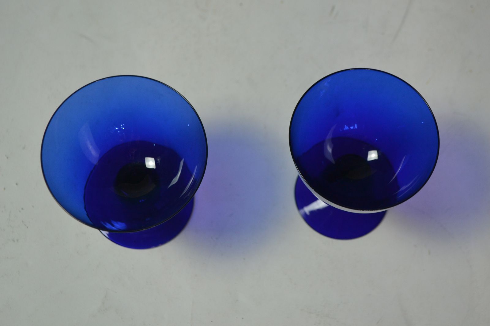 Discover our rare pair of 19th Century Bristol Blue drinking glasses. A perfect addition to any collection. Shop now to secure these unique pieces!

